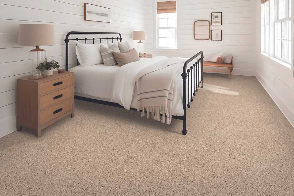 soft plush cut pile carpet in modern farmhouse bedroom with natural wood accents